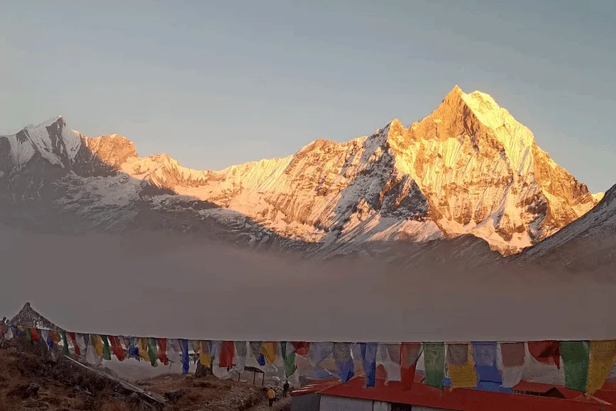 Golden sunset over Machhapuchhre Mountain seen from Annapurna Base Camp in Nepal